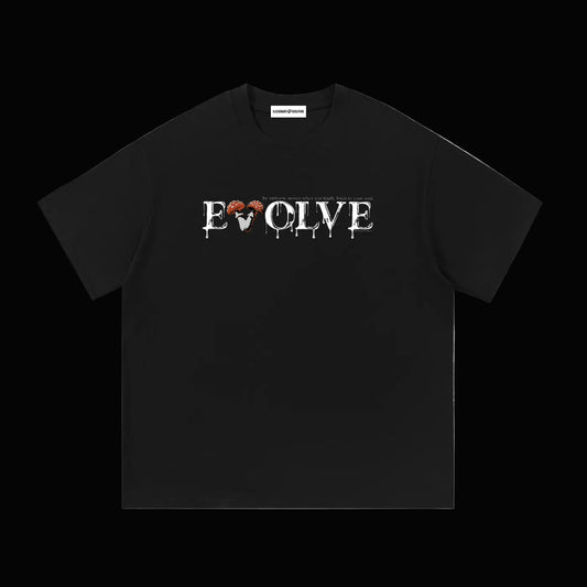 Black shirt that has white text that says "EVOLVE The universe moves when you finally listen to your soul" on a black background. 
