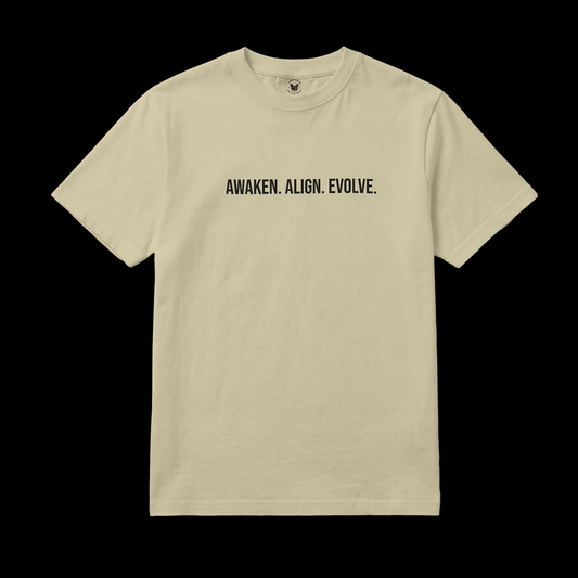 Sand t-shirt with 'AWAKEN. ALIGN. EVOLVE.' written in black text. Puff lettering. 